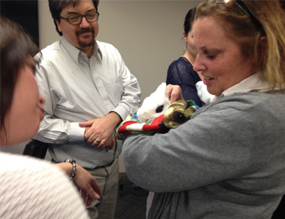 people adoring a bunny