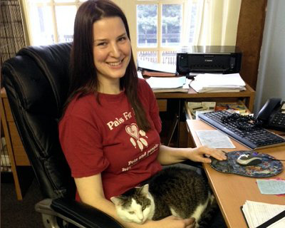 Pals For life Volunteer holding a cat